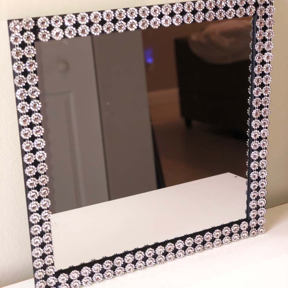Silver Decor and Black Frame Mirror